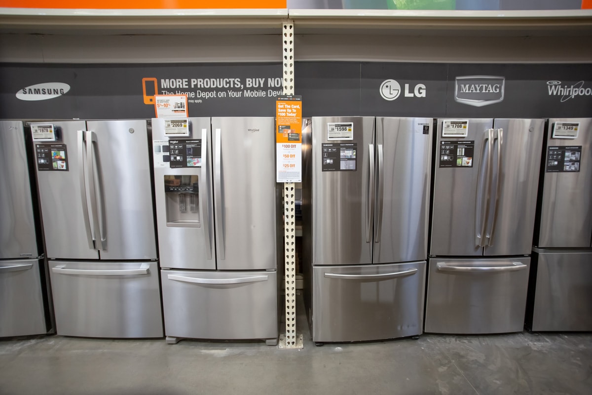 A view of several refrigerators on display at a local home improvement store.