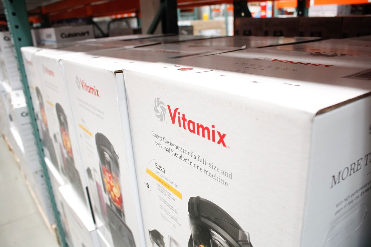Huge boxes of Vitamix blenders for sale at a store shelf