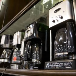 Several Cuisinart coffee maker machines on display at a local department store, How To Reset A Cuisinart Coffee Maker