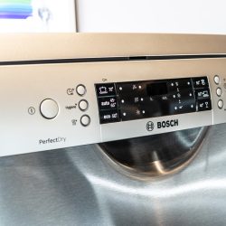 A Bosch dishwasher displayed for sale at a store, Bosch Dishwasher Flashing Red Light - What To Do?