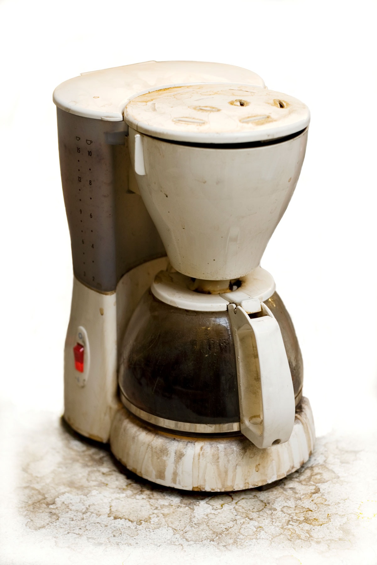 A very used and dirty coffee machine