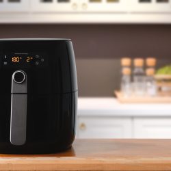 Air fryer machine cooking potato fried in kitchen. Lifestyle of new normal cooking., Air Fryer Light Not Working - What's Wrong?