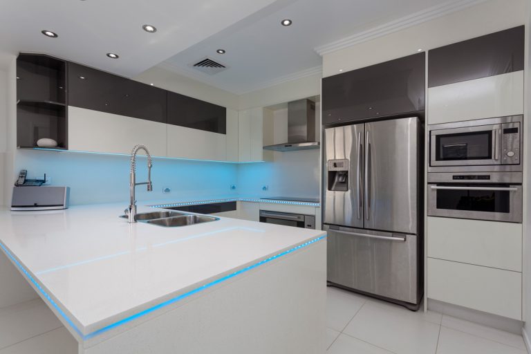 Black and white inspired kitchen matched with white countertop and white cabinets, Does A Refrigerator Need A Dedicated Circuit?
