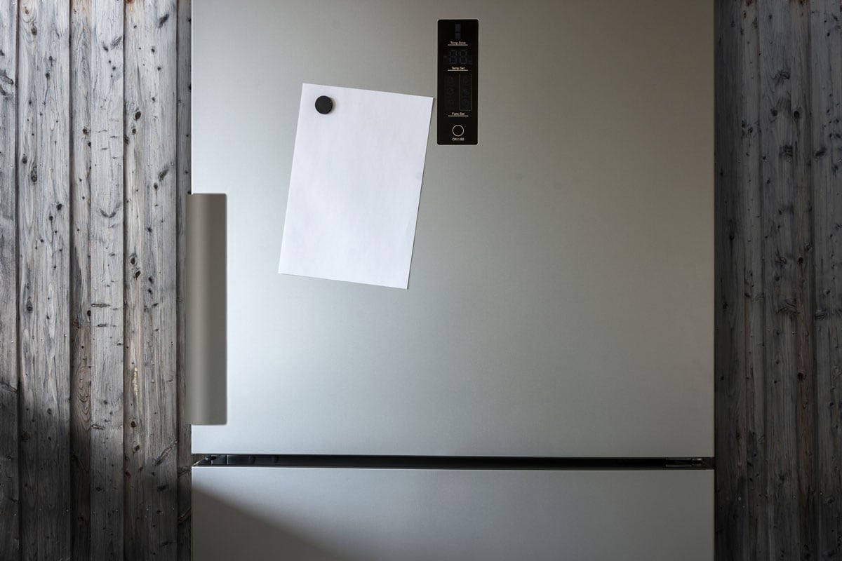 Empty Paper Sheet On Fridge Door
