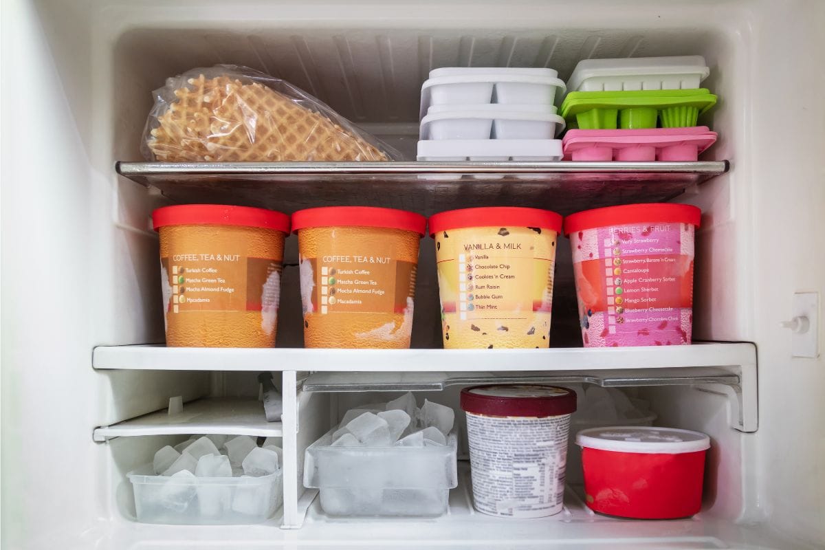 Full of bucket container ice creams flavors and ice cubes in freezer get ready for summer, What Temperature Should A GE Freezer Be Set At?