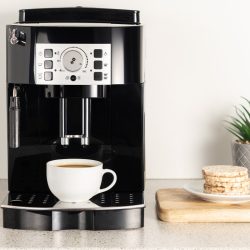 Modern espresso coffee machine with a cup in interior of kitchen closeup - What Should I Do If My Keurig Slim Is Not Working