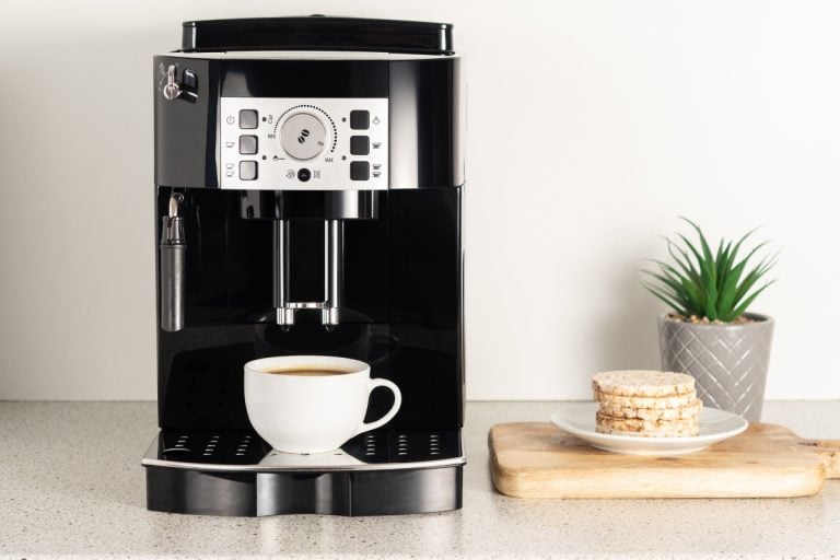 Modern espresso coffee machine with a cup in interior of kitchen closeup - What Should I Do If My Keurig Slim Is Not Working