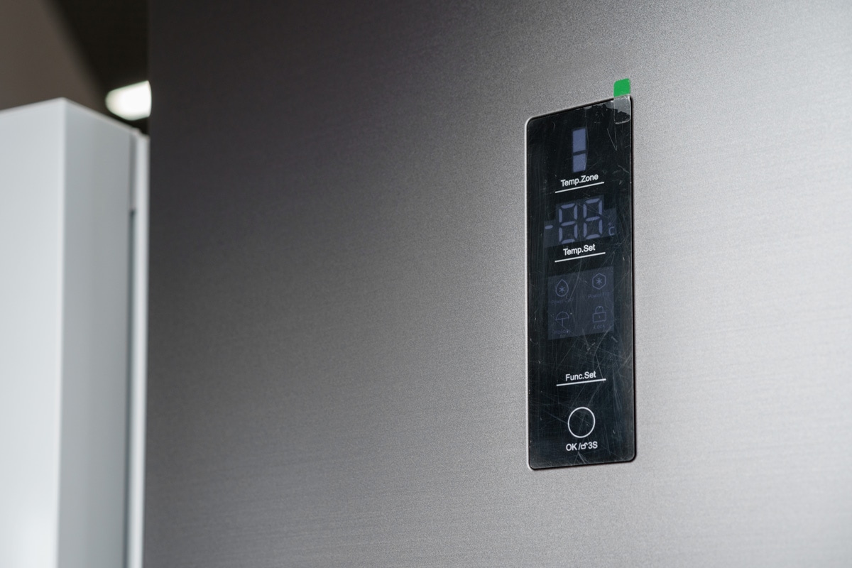 Modern fridge temperature control panel close up