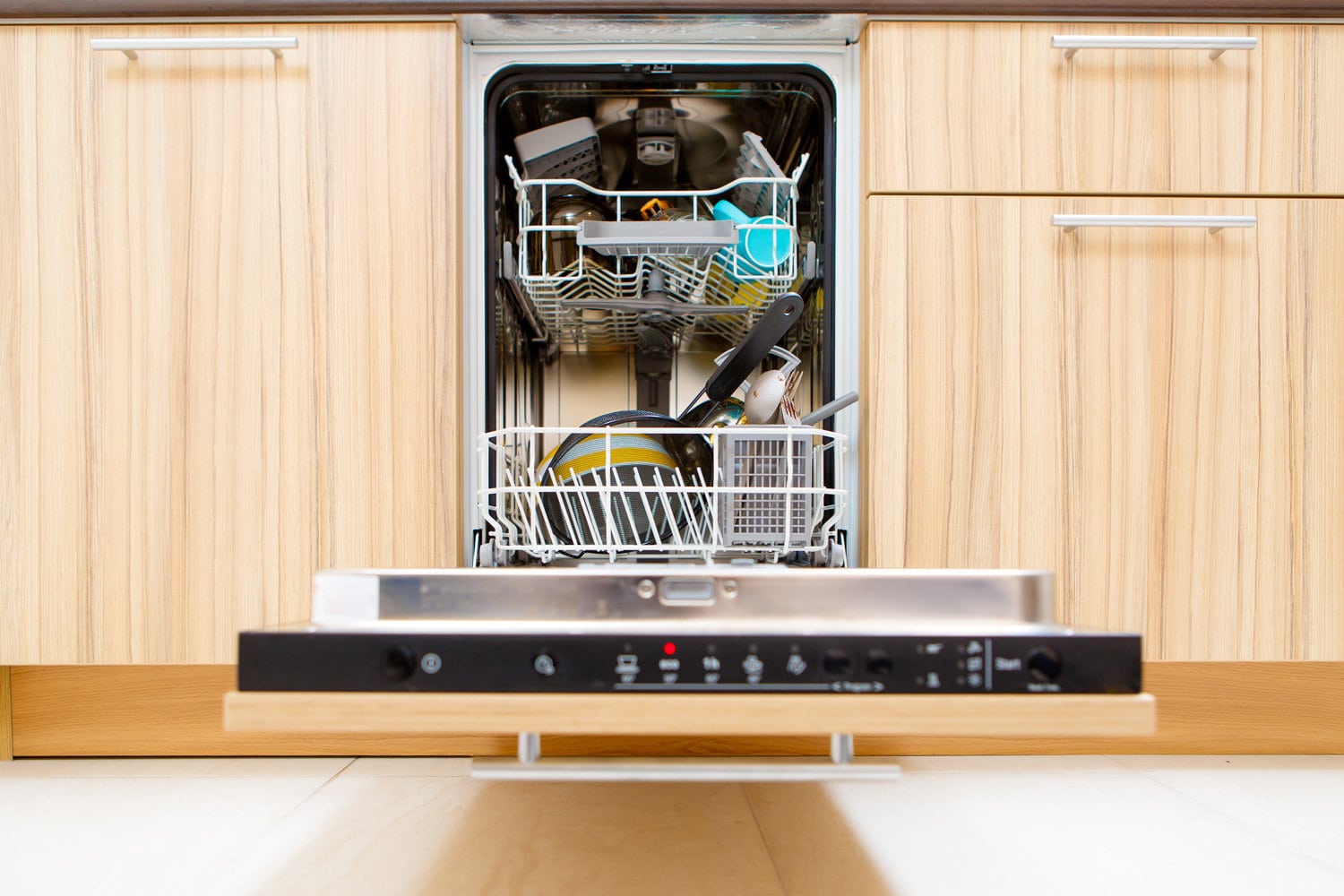 Picture of open dishwasher with dirty dishes — Photo