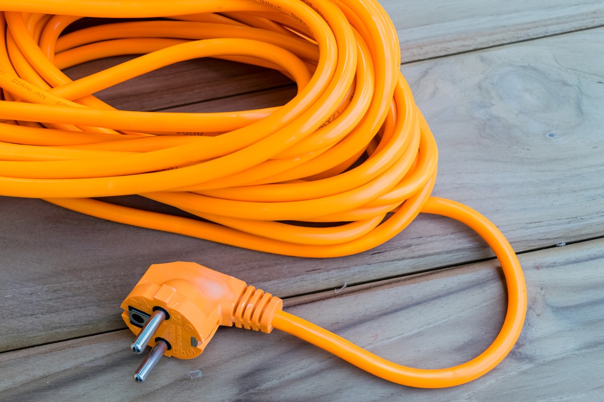 close up color orange electric extension cord