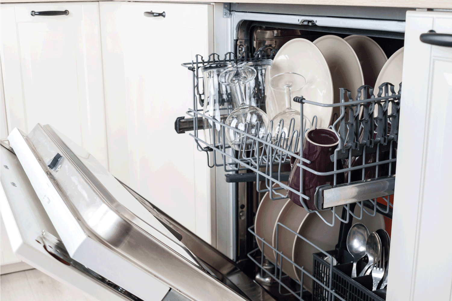 dishwasher close-up with washed dishes, easy to use and save water, eco-friendly,