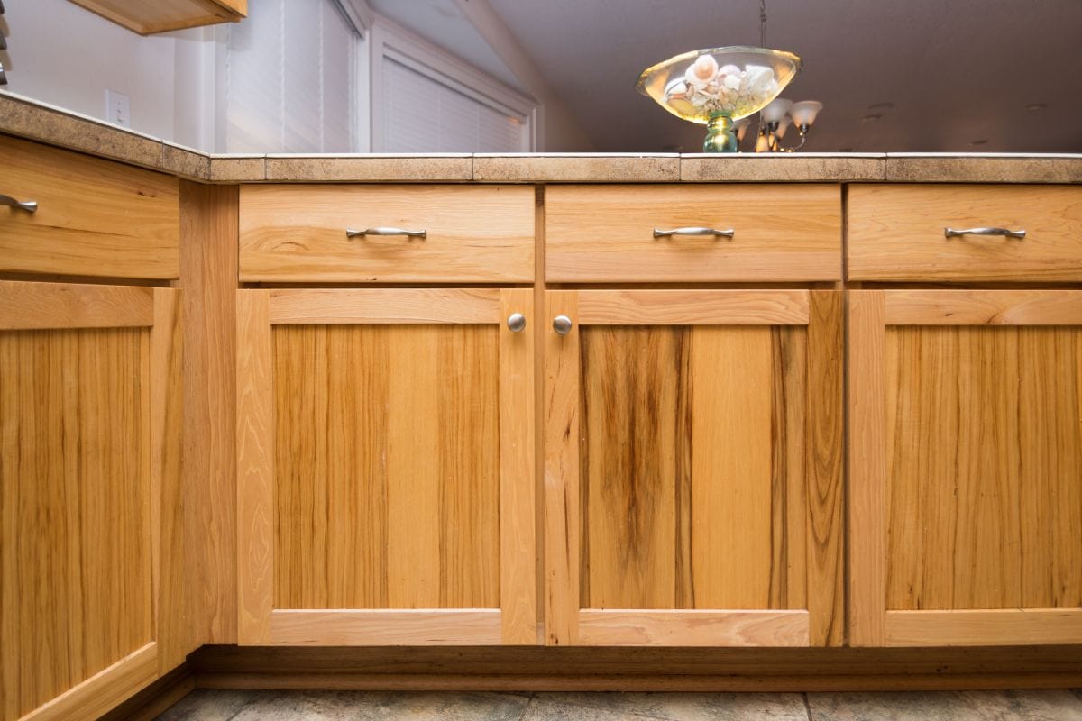 Beautiful maple woodwork on kitchen cabinets