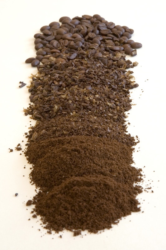 Ground coffee on a white background
