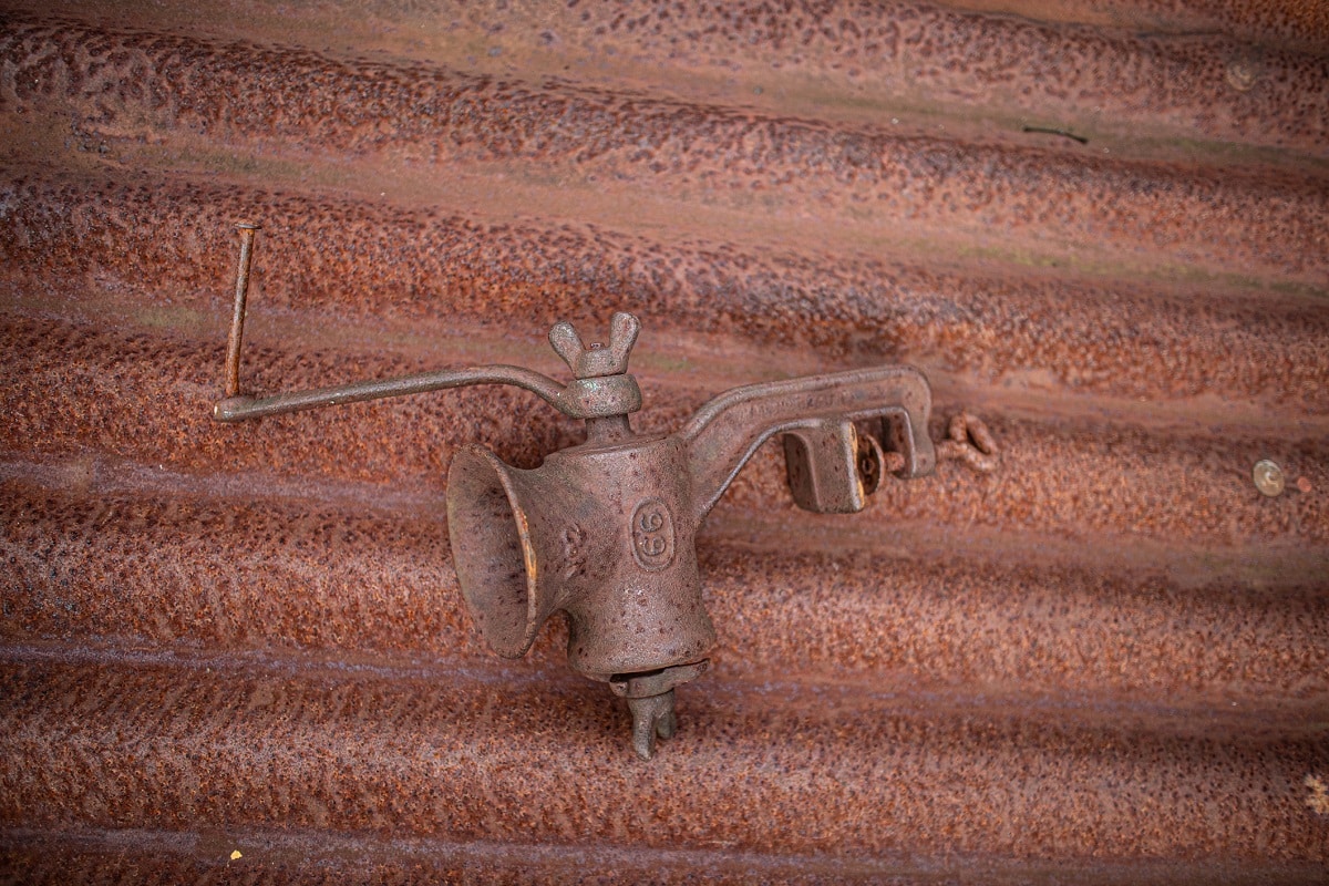 How To Restore An Old Meat Grinder - Really rusty old meat grinder sat on an equally rusty corrugated roof panels