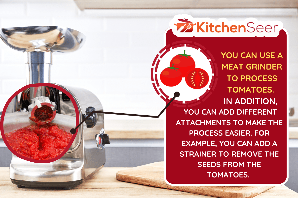 Meat grinder with fresh meat on a wooden table in kitchen interior. - Can I Use A Meat Grinder For Tomatoes?