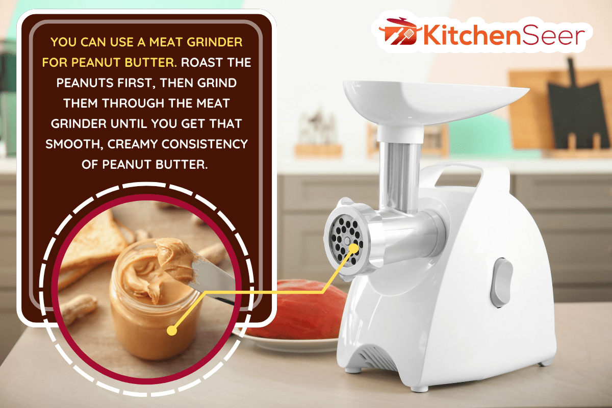 Meat grinder with fresh meat on kitchen table. - Can I Use A Meat Grinder For Peanut Butter?