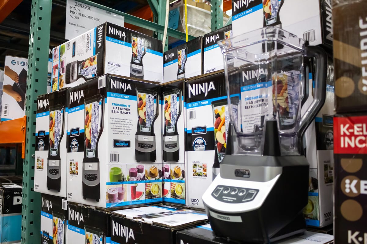 A view of a Ninja blender appliance on display next to several packaged appliances at a local big box store.