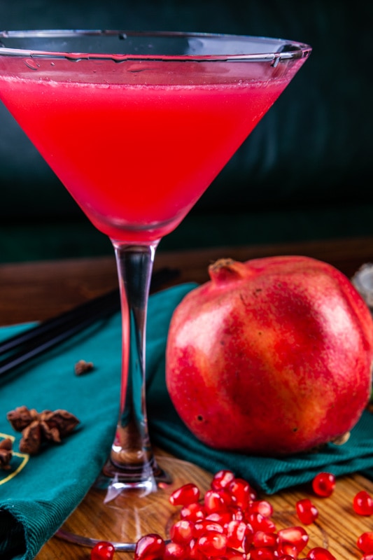 Pomegranate cocktail in martini served at the bar