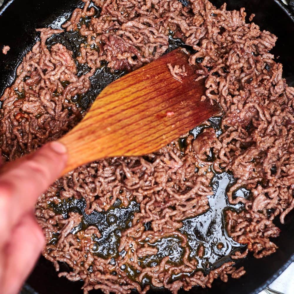 Roasting minced meat in a pan. 