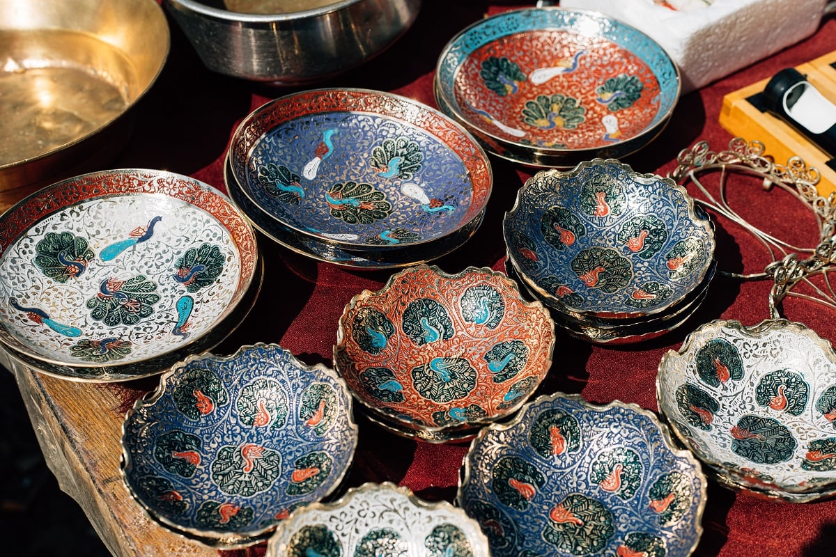 Glazed terra cotta - Old Handmade Ornate Pottery Plates. Set Of Decorative Ceramic Dishes Hand-painted Of Floral Pattern.