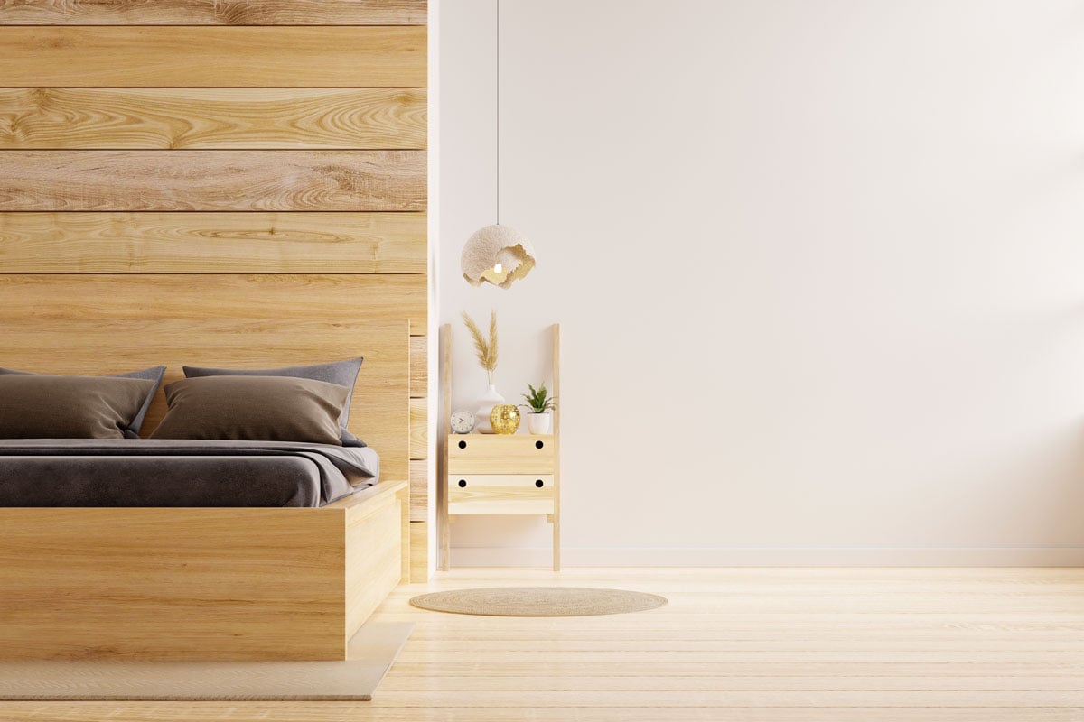 photo of a minimalist modern design bedroom with pallet wood flooring attached on the floor