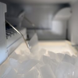 photo of an inside-freezer-automatic-ice-maker-pile, Ikich Ice Maker Add Water Light Stays On - Why And What To Do?