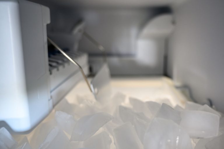 photo of an inside-freezer-automatic-ice-maker-pile, Ikich Ice Maker Add Water Light Stays On - Why And What To Do?