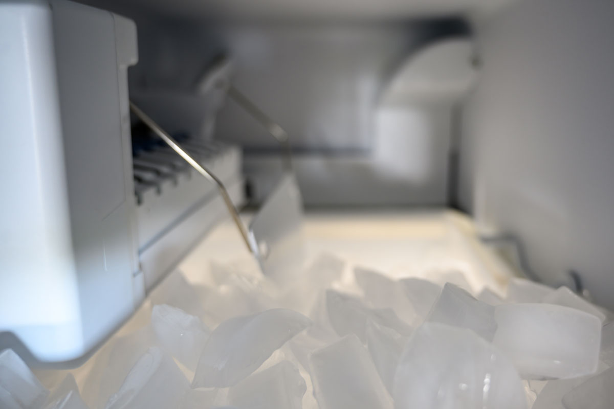 photo of an inside-freezer-automatic-ice-maker-pile