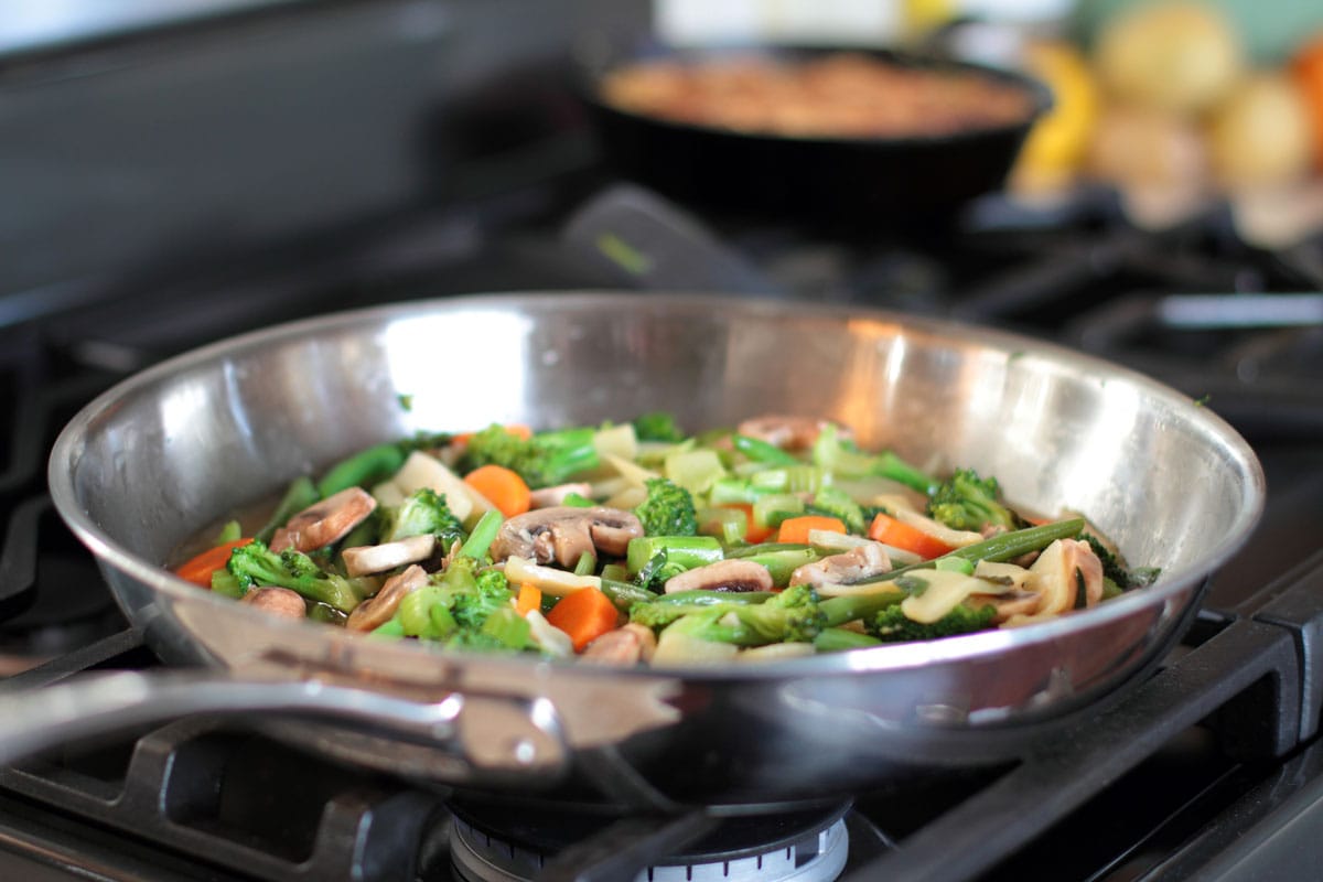 stir-fry-vegetables-cooking-stainless-steel