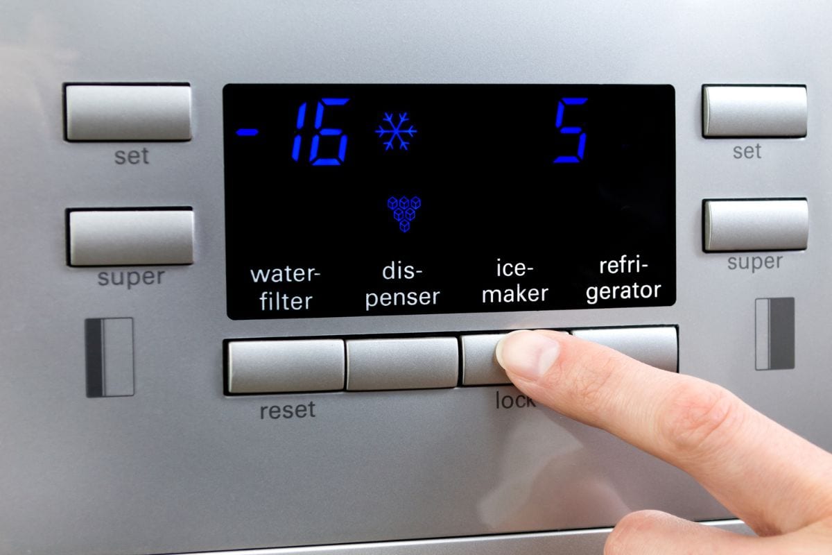 Choosing ice-maker programme at refrigerator displayer.