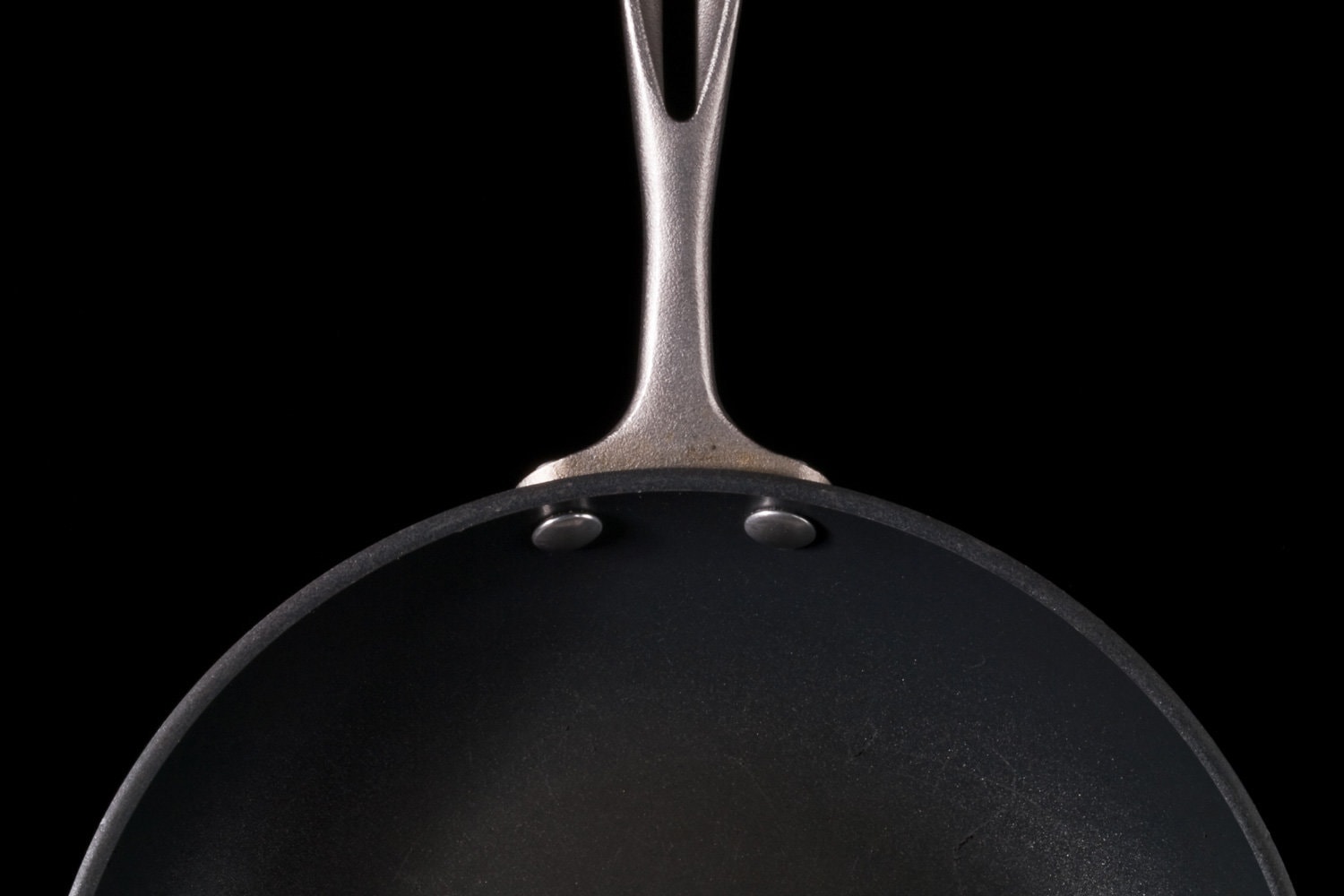 Close up of frying pan on black background, Cookware