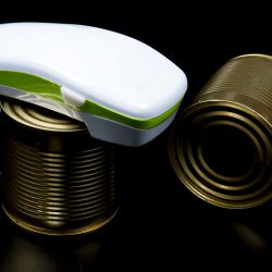 Electric can opener on a canned food, How To Use A Kitchen Mama Can Opener [Quickly & Easily]