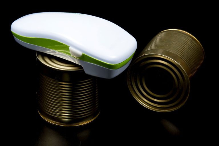Electric can opener on a canned food, How To Use A Kitchen Mama Can Opener [Quickly & Easily]