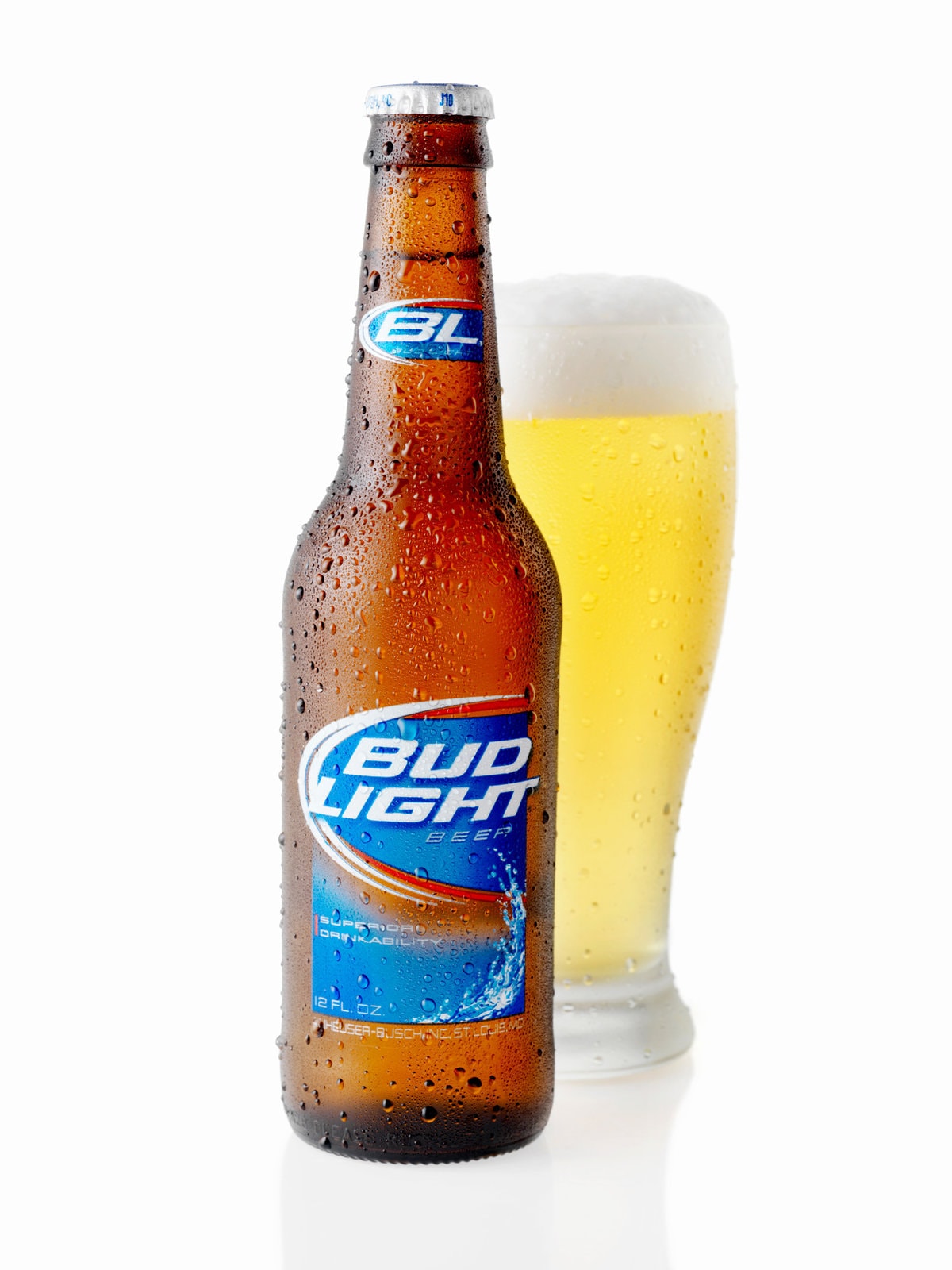 Ice Cold Bottle of Bud Ligh , A 12oz, American Bottle and Glass of Bud Light shot on white, Bud Light is made by the Anheuser-Busch Company