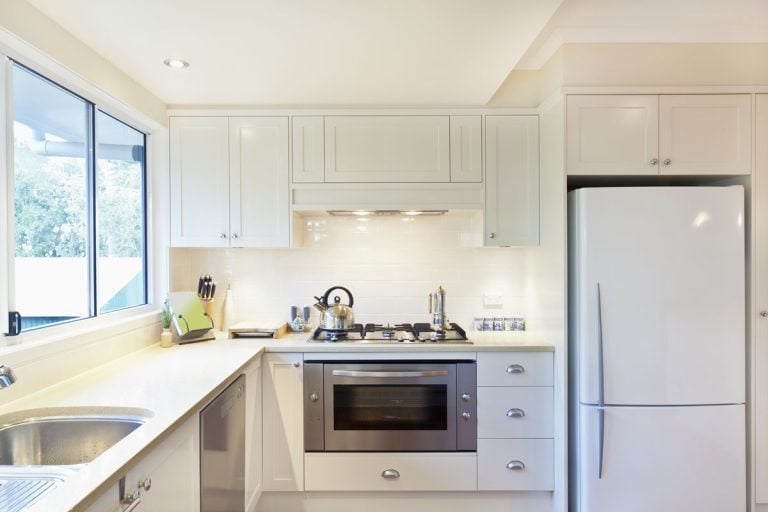 Modern gourmet kitchen interior, How To Fill Gap Above Fridge