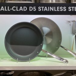 Nonstick All Clad pot and pan aisle at a Williams Sonoma store, Do I Need To Season All Clad Pans?