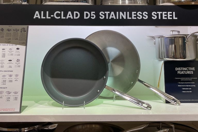 Nonstick All Clad pot and pan aisle at a Williams Sonoma store, Do I Need To Season All Clad Pans?