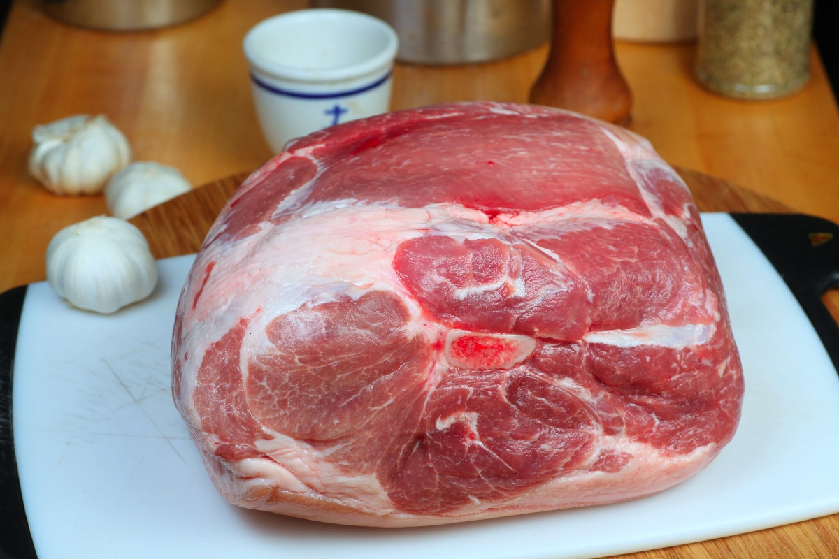 Pork shoulder on cutting board