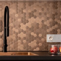 golden-hexagonal-wall-tiles-stylish-kitchen, Pros And Cons Of Copper Countertops - Considerations For Homeowners