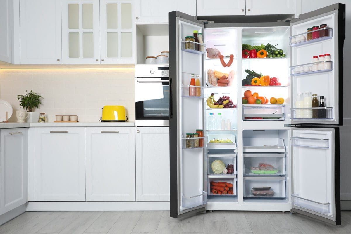 open-refrigerator-filled-food-kitchen