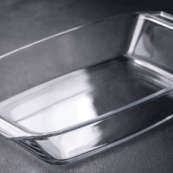 rectangular glass empty dish for baking on a dark concrete background. Can You Use Visions Cookware On A Gas Or Glasstop Stove