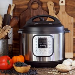 Instant Pot pressure cooker on kitchen counter with beans and rice., Can You Put Foil In An Instant Pot?