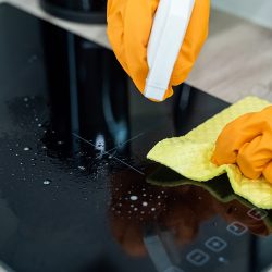 Spraying oven cleaner onto the stovetop, Can You Use Oven Cleaner On A Stove Top?