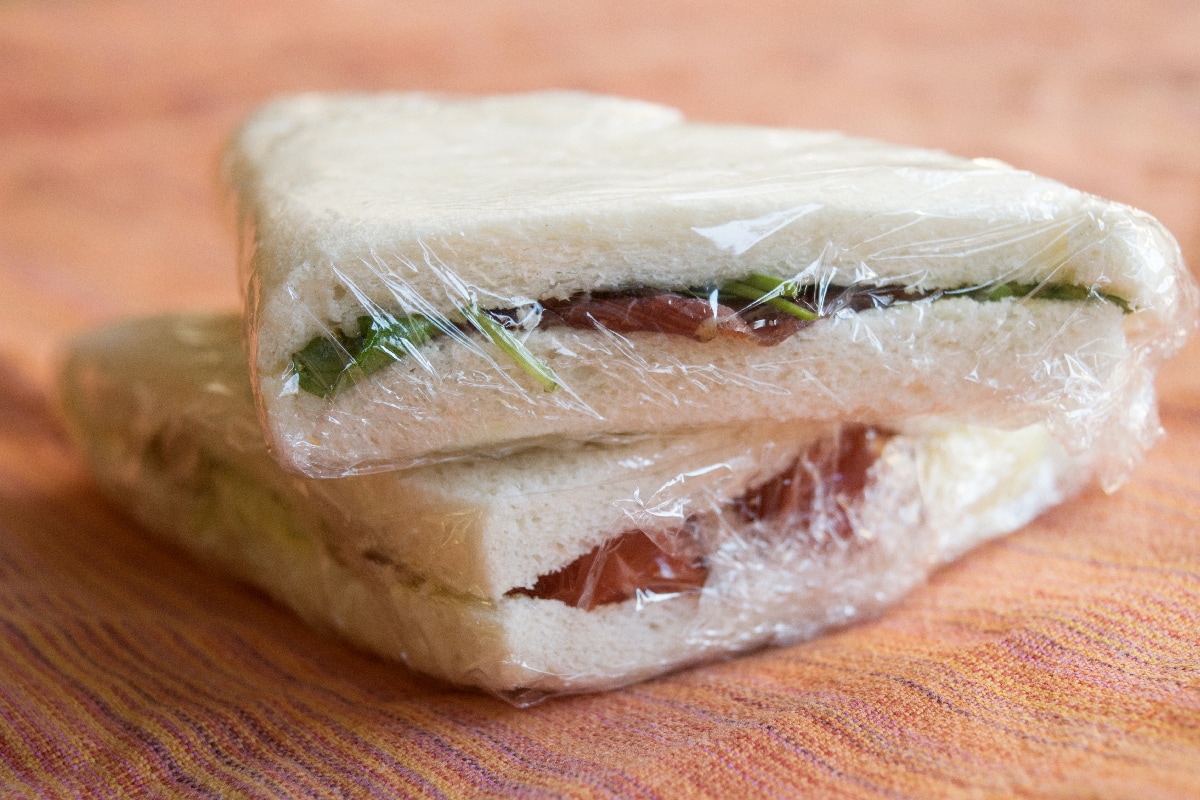 Stuffed take away sandwiches wrapped in transparent film