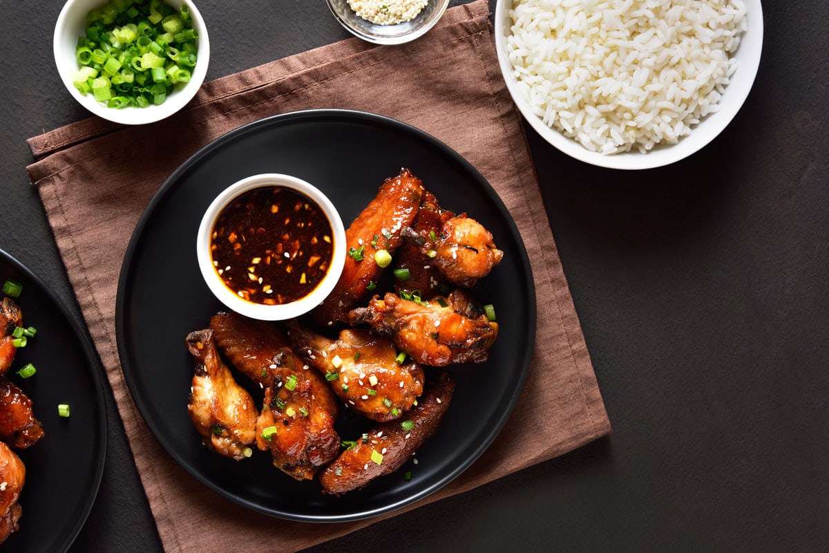 Delicious Honey soy glaze chicken cutlets garnished with scallions