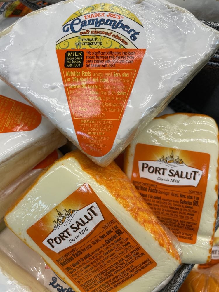 Small containers of Port Salut cheese