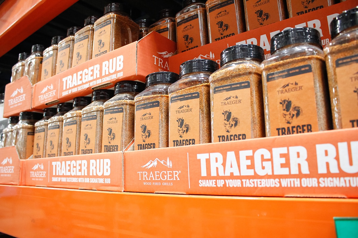 Several containers of traeger seasoning on display at a local grocery store