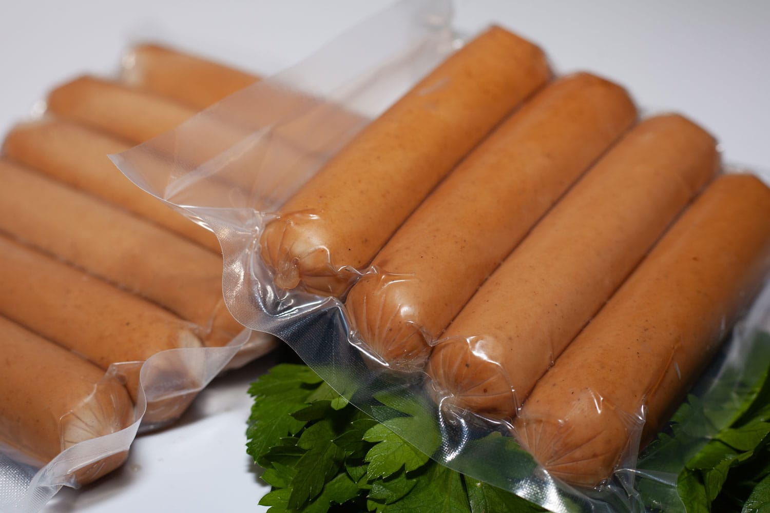 Turkey sausages in food packaging. Meat products of poultry 