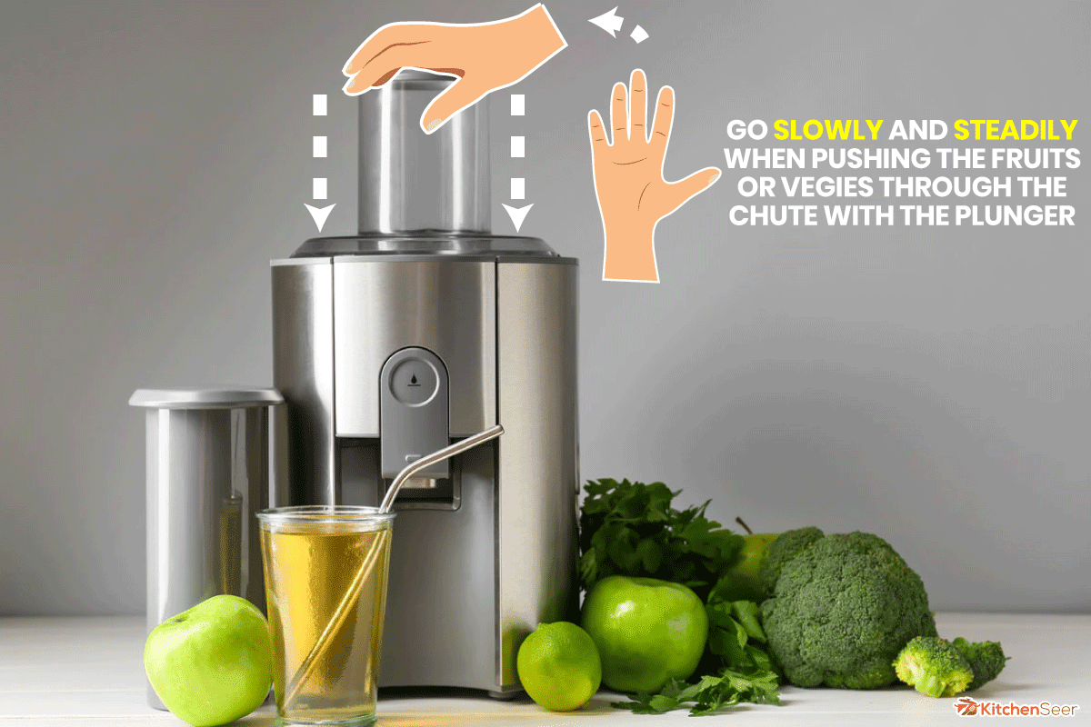 New modern juicer and glass of fresh juice on table, How to Use a Breville Juicer [Step by Step Guide]