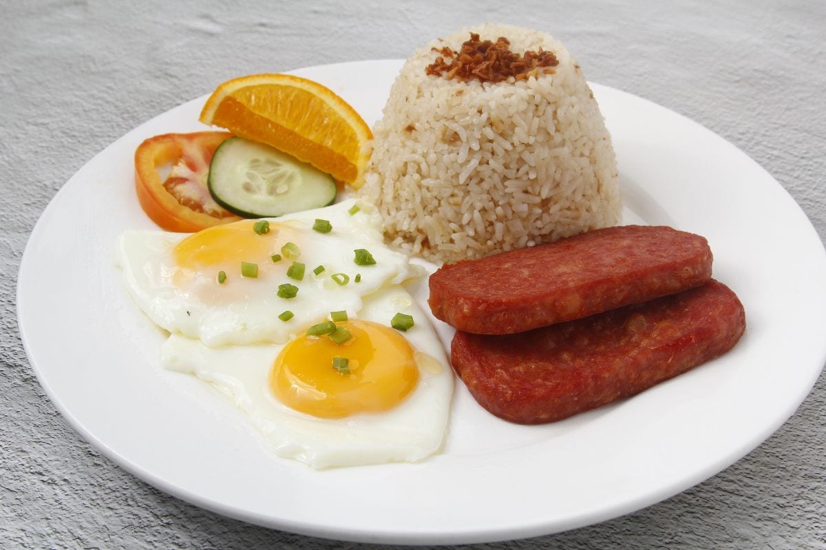 Freshly cooked Filipino food called Spamsilog or slices of spam, egg and fried rice